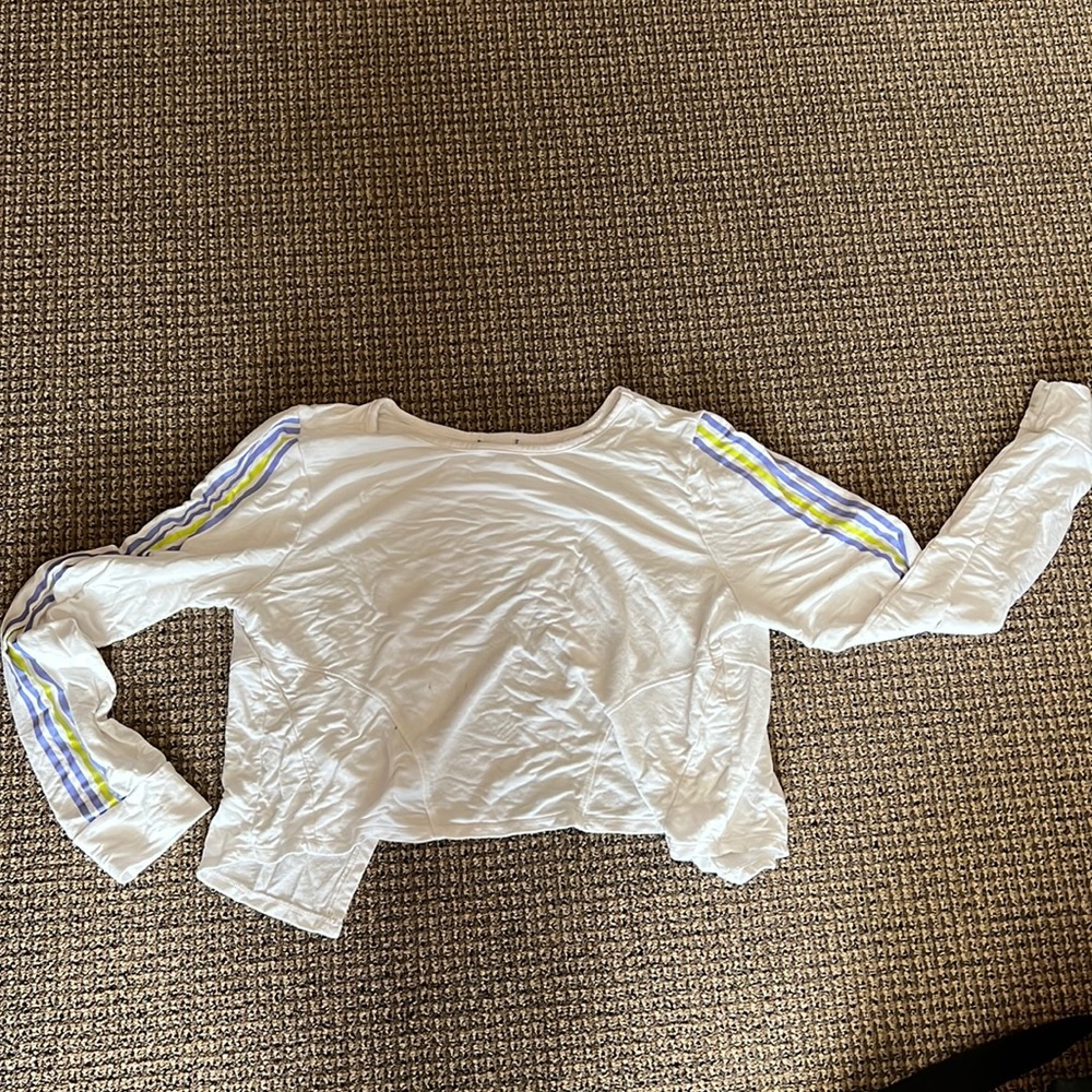 White opened back, long sleeved crop top